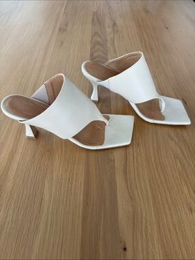 Light tan slip on heels, worn lovingly, size 38 / 8, made by Toral